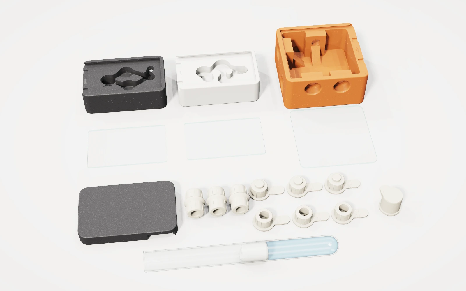 Everything in the Scout Basecamp box laid out: the three nests, three lids, the Cover, plugs, Links and the test tube